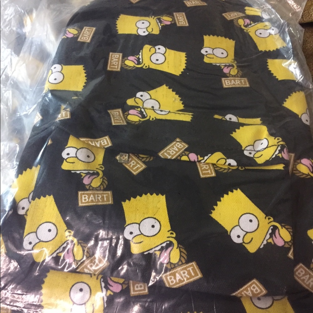 Children’s back pack. Black and yellow print.